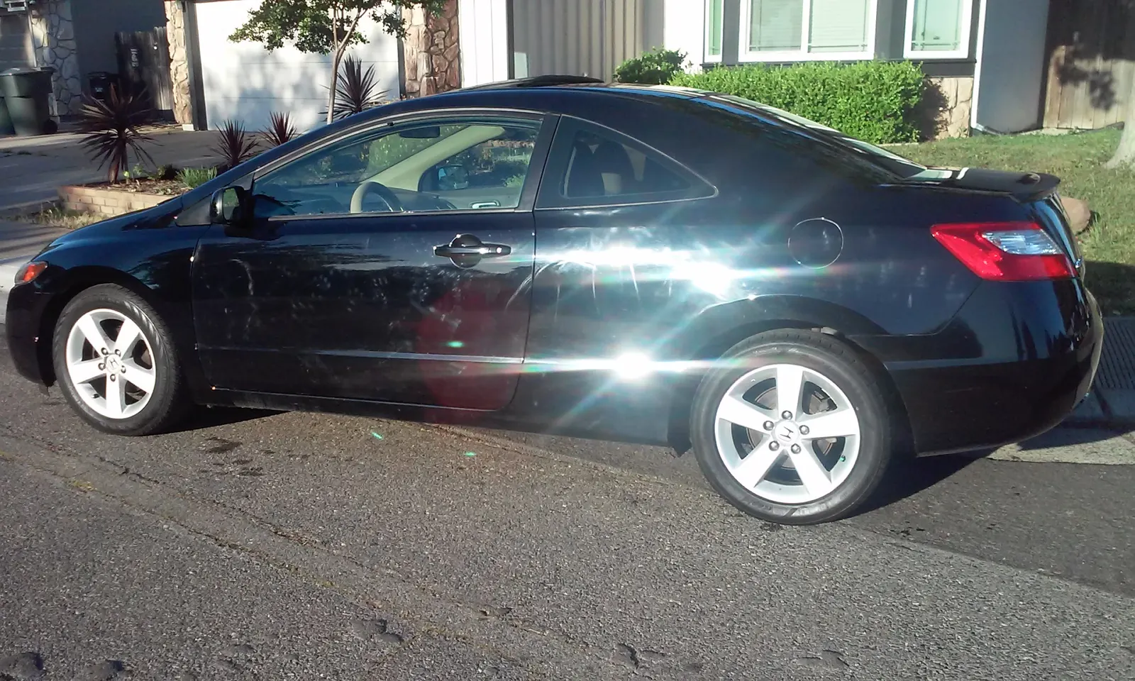 Black Honda Civic coupe, exterior detail