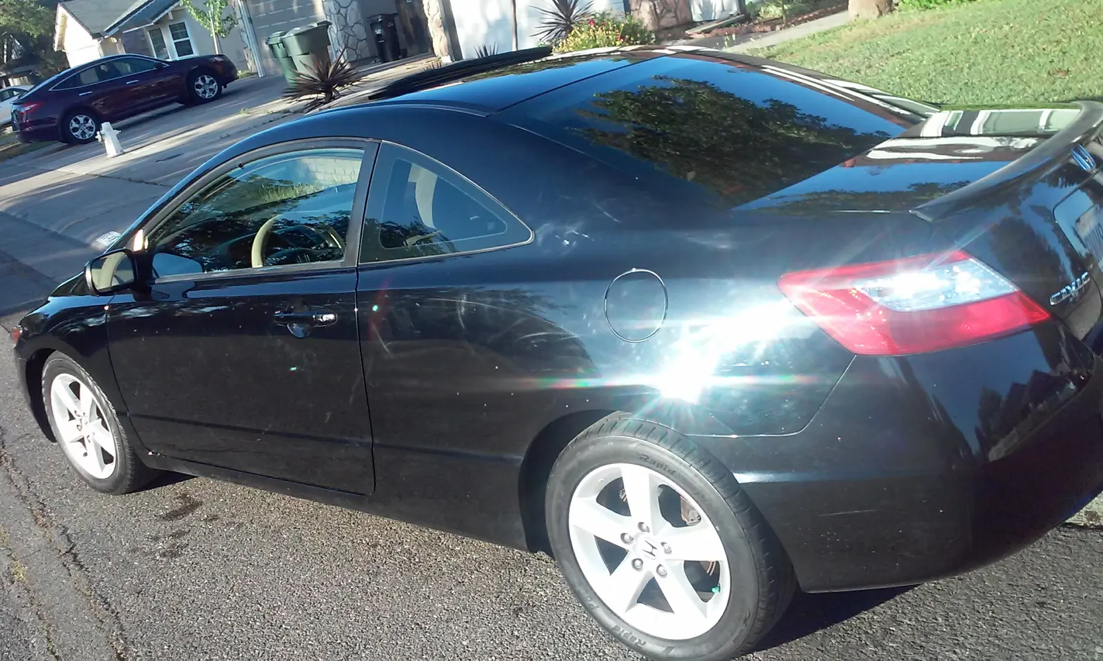 Black Honda Civic coupe, exterior detail
