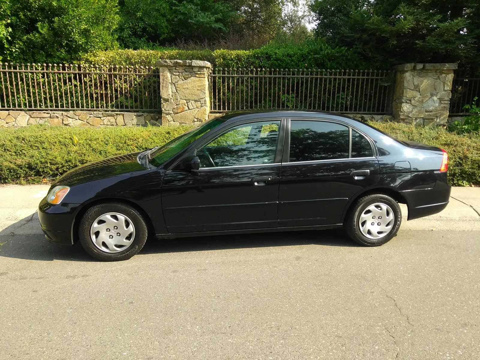 Black Honda Civic sedan, exterior detail