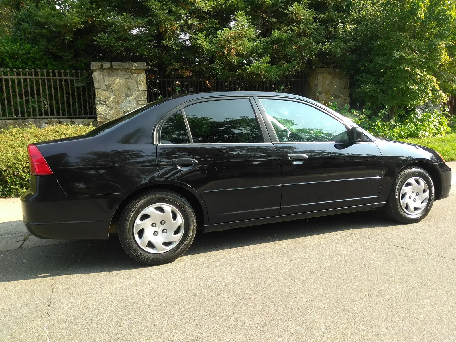 Black Honda Civic sedan, exterior detail