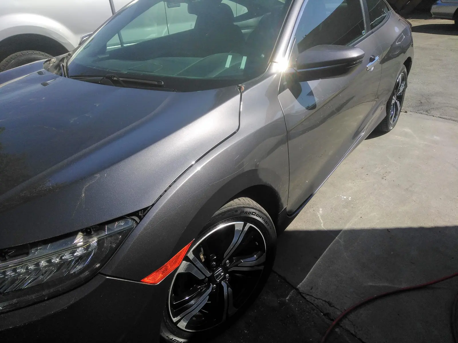 Gray Honda Civic, front-end collision repair