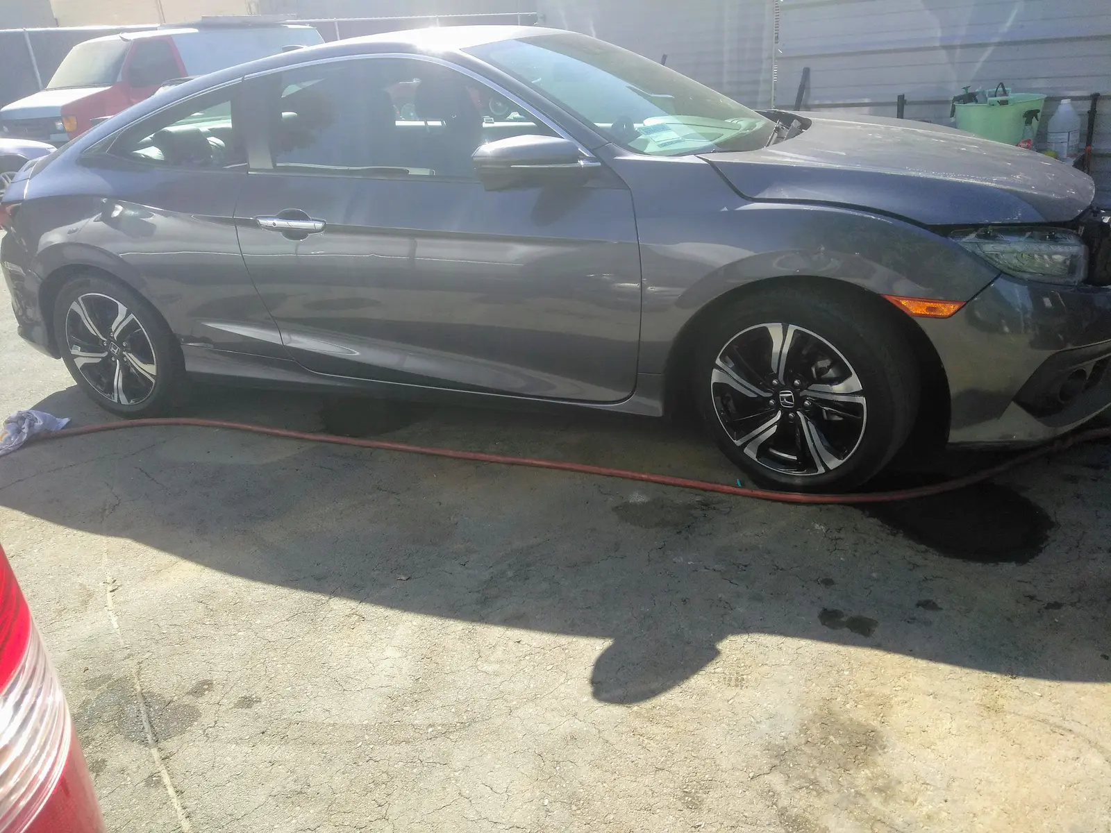 Gray Honda Civic, front-end collision repair
